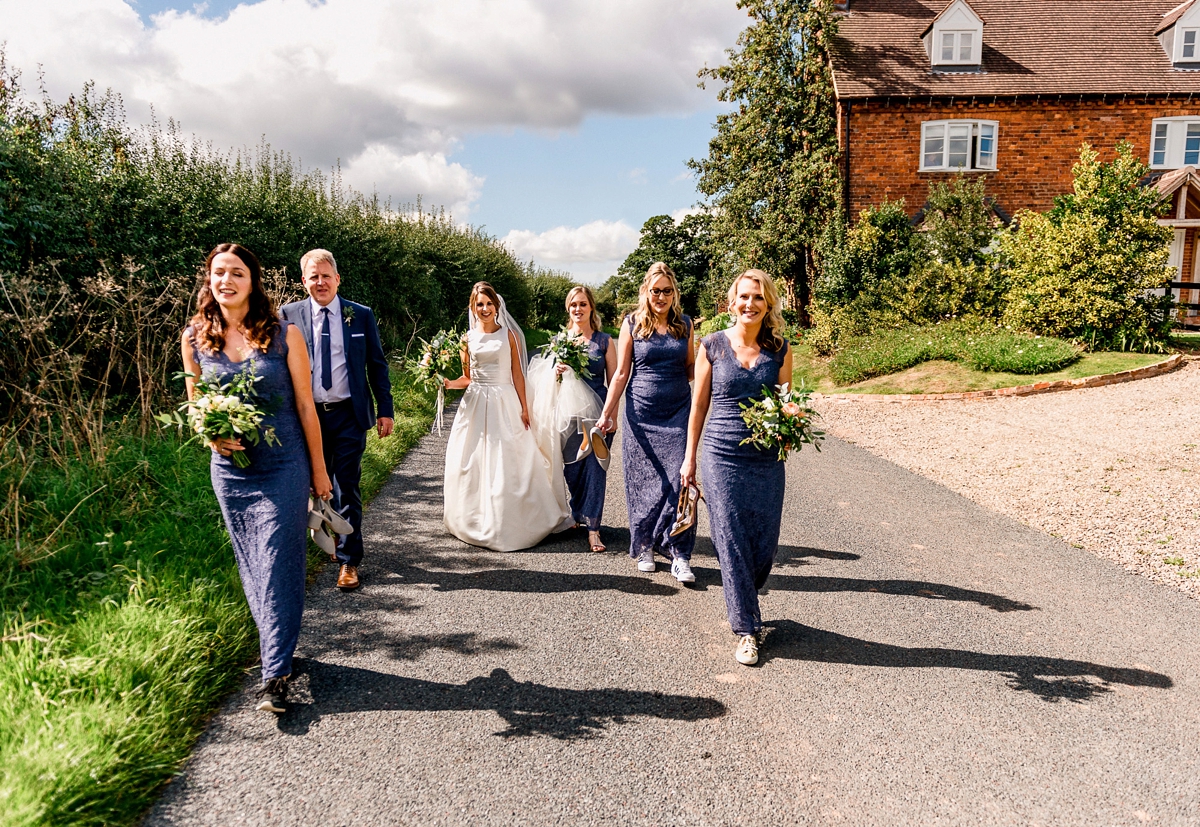 24 A Pronovias backless gownf or a simple relaxed barn wedding