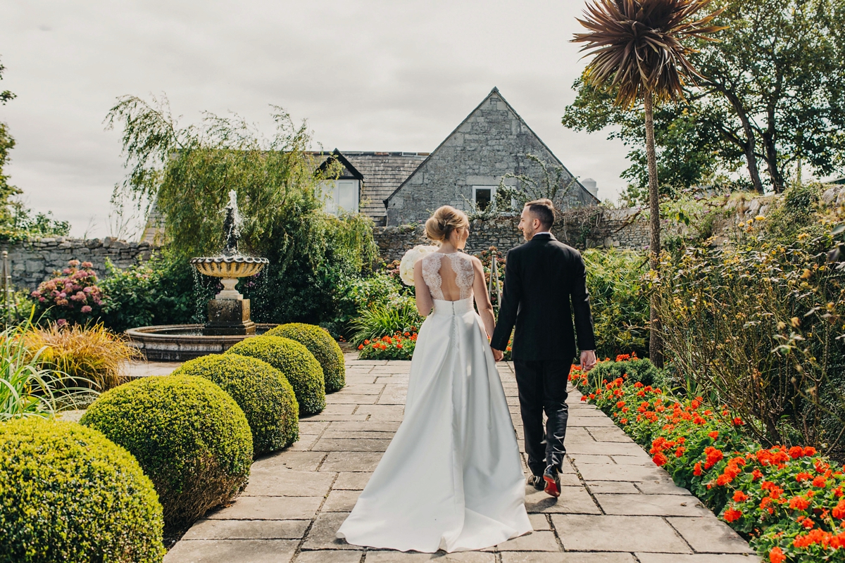 25 A Jesus Peiro gown for a Dorset castle wedding