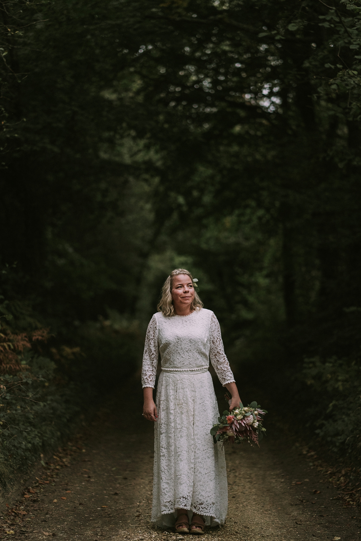 28 A bride wearing a Moonsoon dress for her treetop Autumn wedding