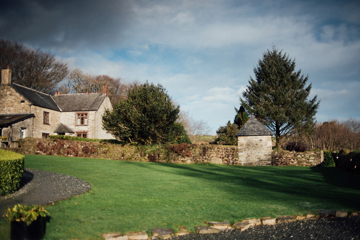 3 A Rembo Styling gown and leather jacket for a winter barn wedding in Cornwall