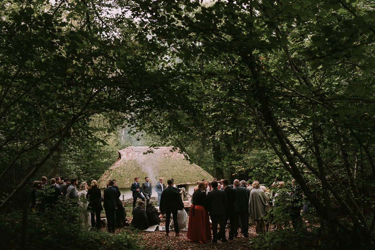 30 A bride wearing a Moonsoon dress for her treetop Autumn wedding