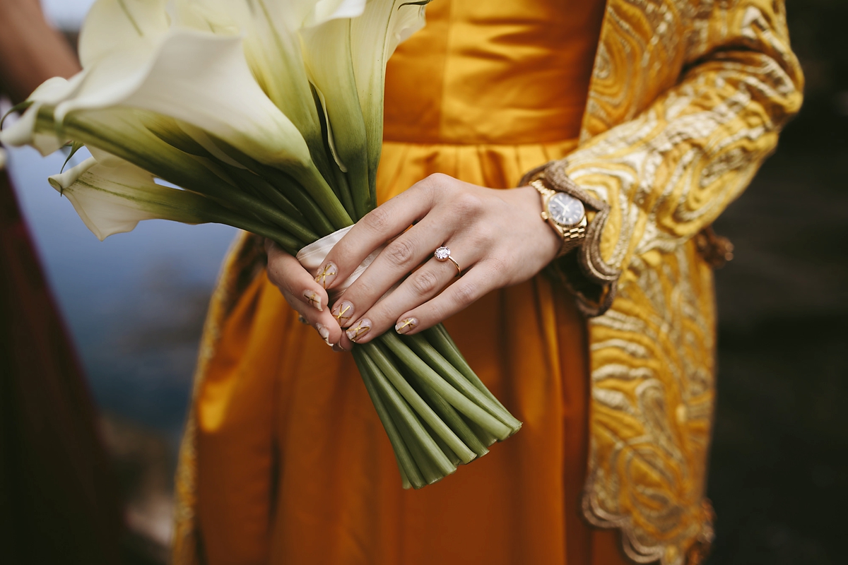 30 A yellow 1970s vintage Christian Dior gown and cape for a modern alternative Scottish wedding