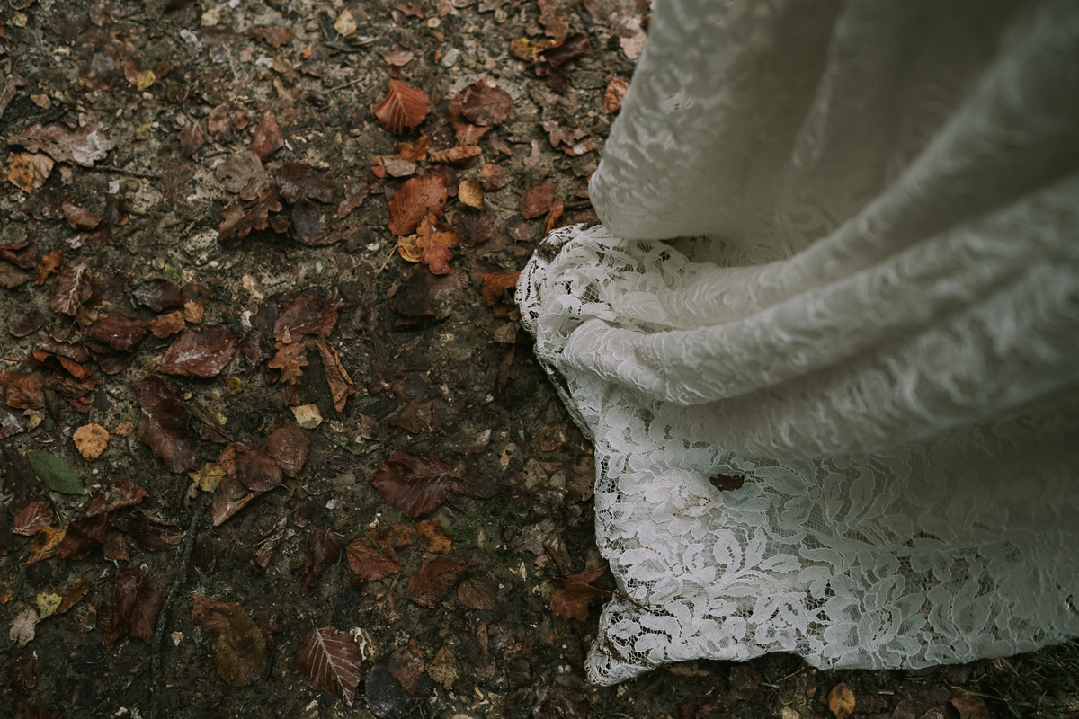 31 A bride wearing a Moonsoon dress for her treetop Autumn wedding