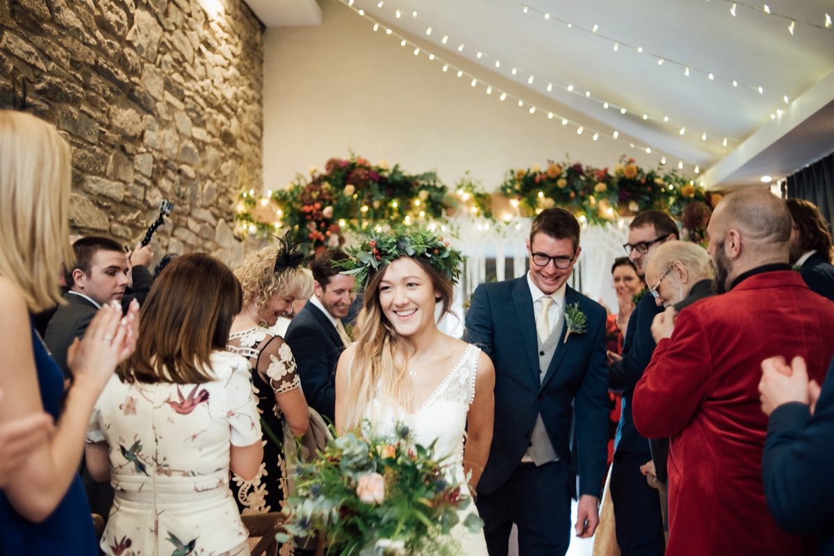 34 A Rembo Styling gown and leather jacket for a winter barn wedding in Cornwall