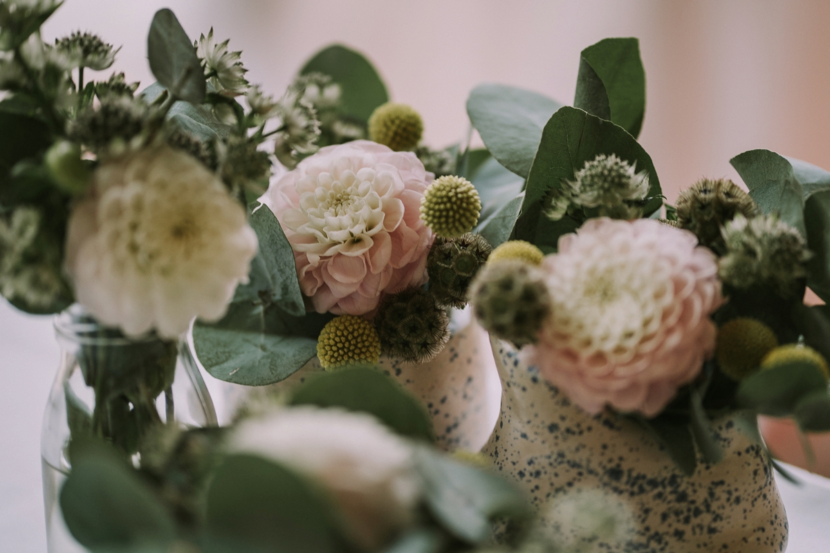 34 A bride wearing a Moonsoon dress for her treetop Autumn wedding