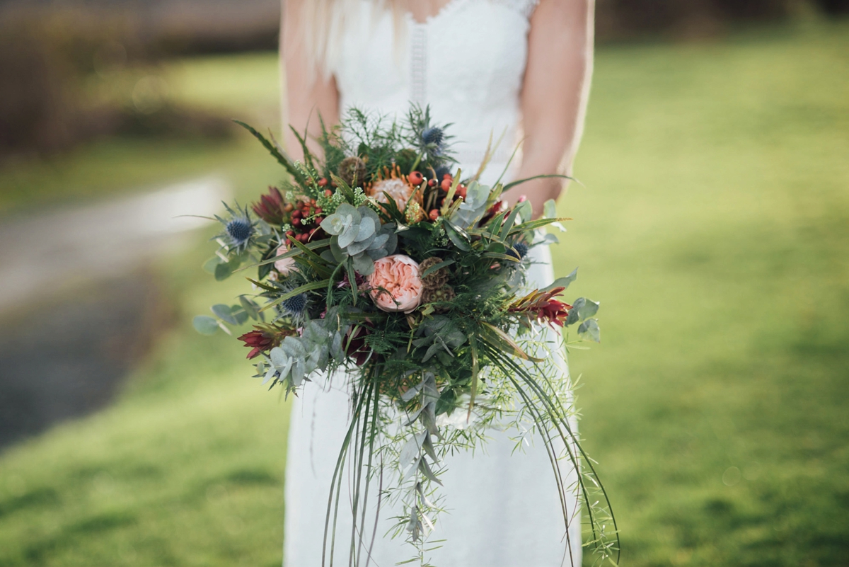 38 A Rembo Styling gown and leather jacket for a winter barn wedding in Cornwall