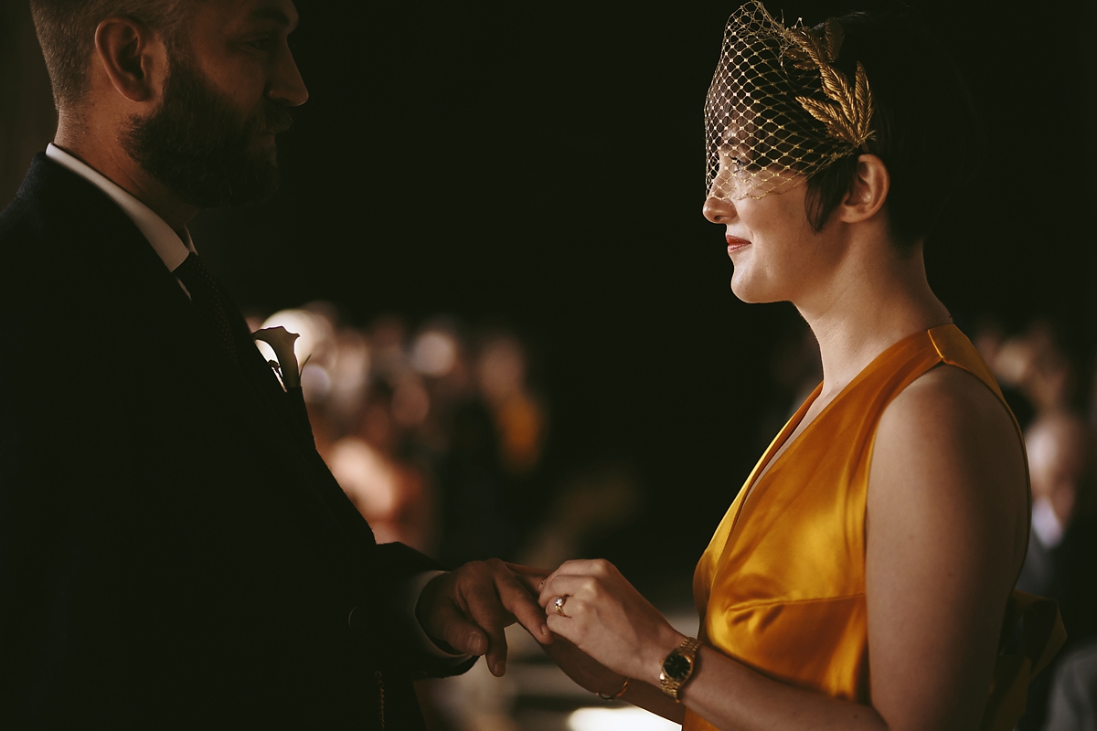 39 A yellow 1970s vintage Christian Dior gown and cape for a modern alternative Scottish wedding