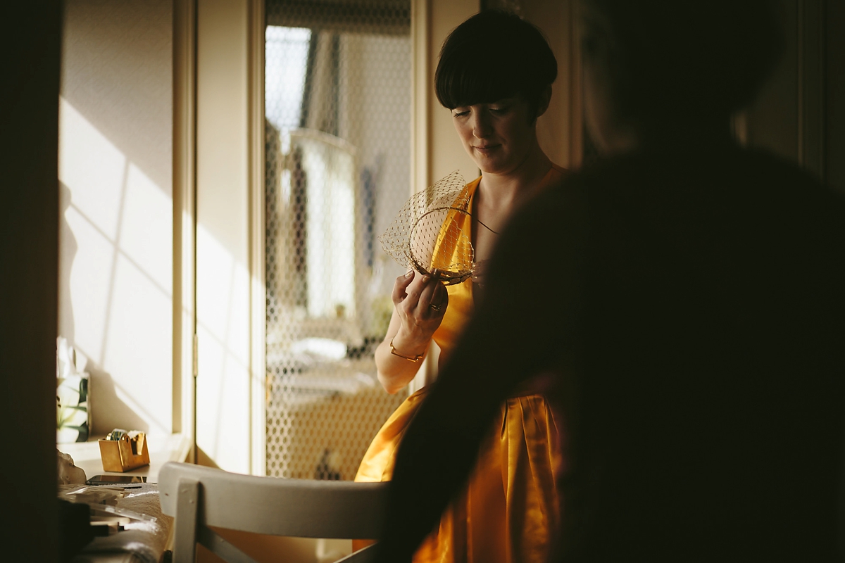 4 A yellow 1970s vintage Christian Dior gown and cape for a modern alternative Scottish wedding