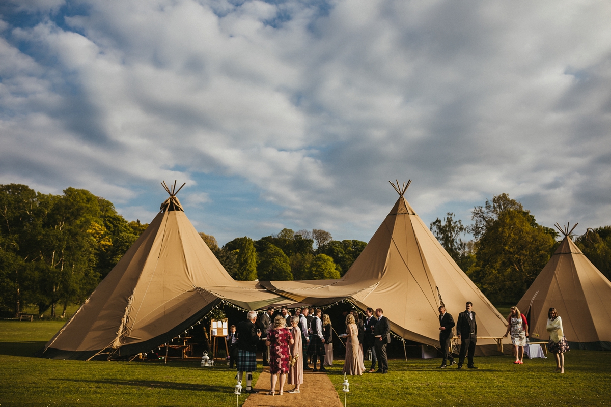 40 A Charlie Brear bride for a country house tipi wedding
