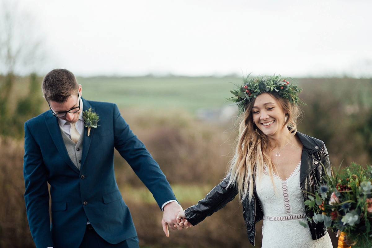 40 A Rembo Styling gown and leather jacket for a winter barn wedding in Cornwall