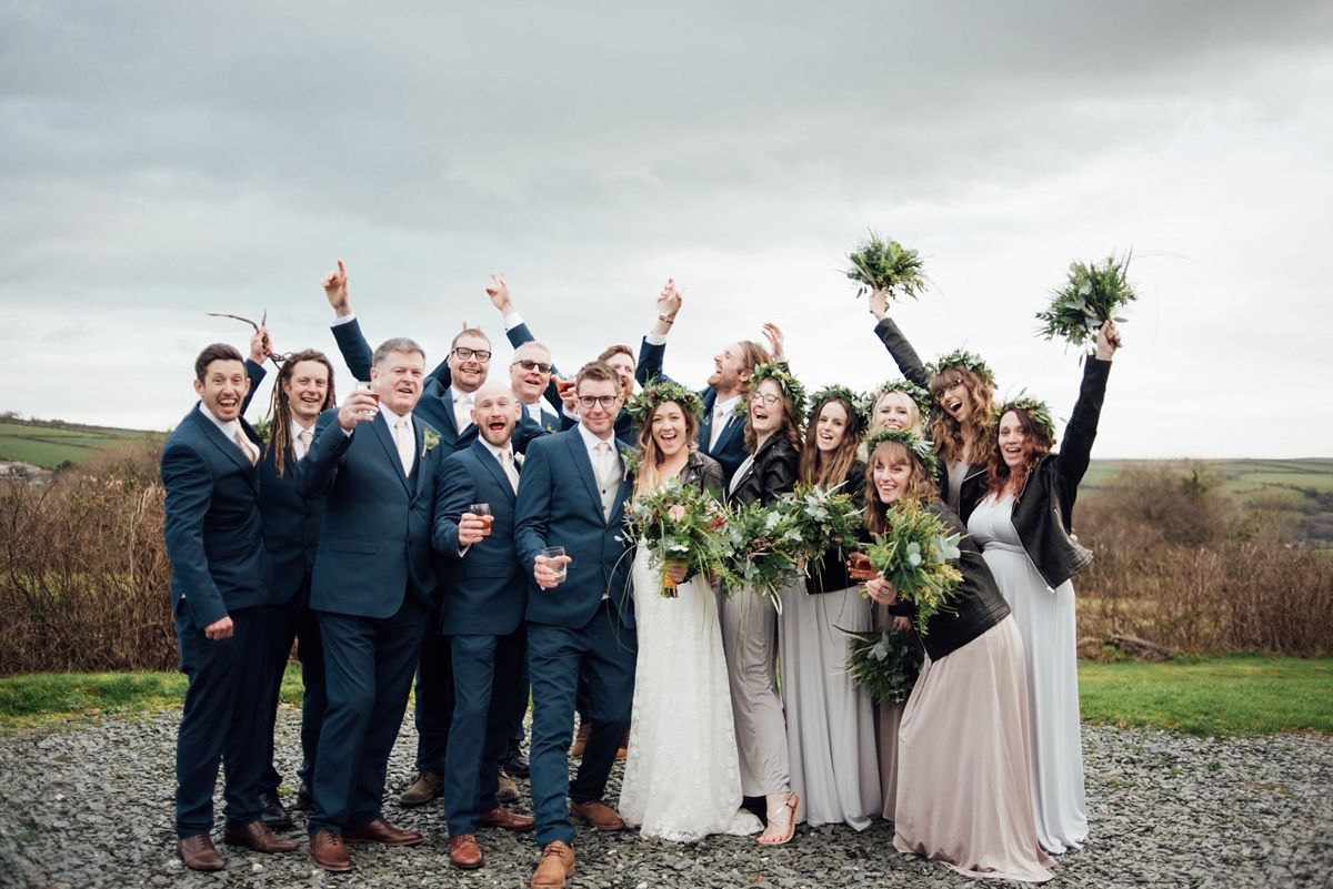 44 A Rembo Styling gown and leather jacket for a winter barn wedding in Cornwall