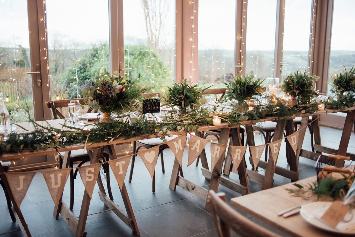 47 A Rembo Styling gown and leather jacket for a winter barn wedding in Cornwall