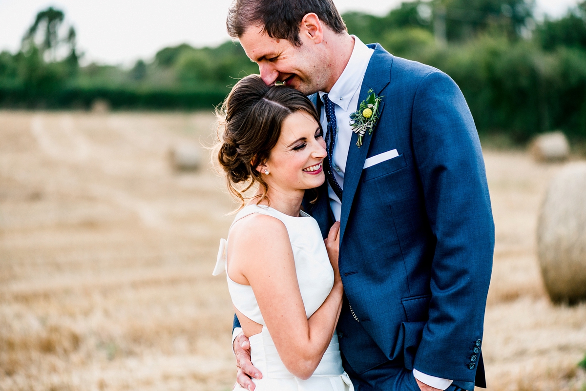 5 A Pronovias backless gownf or a simple relaxed barn wedding