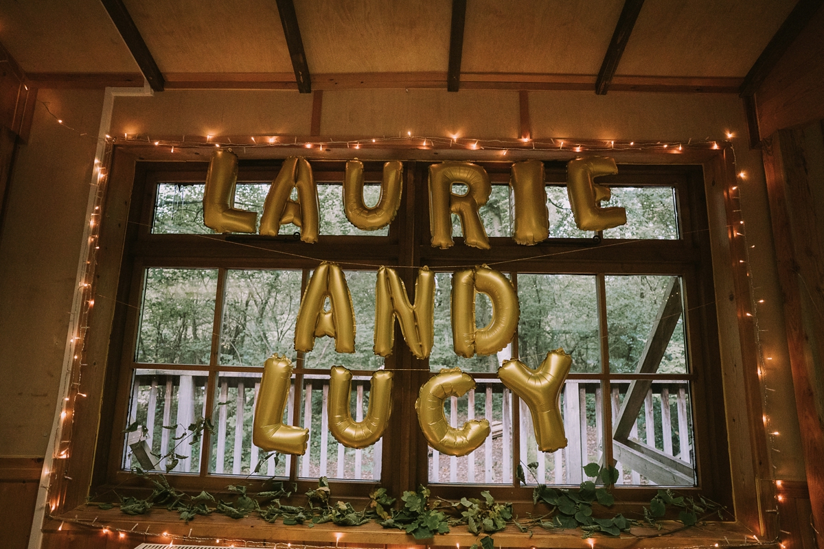 5 A bride wearing a Moonsoon dress for her treetop Autumn wedding