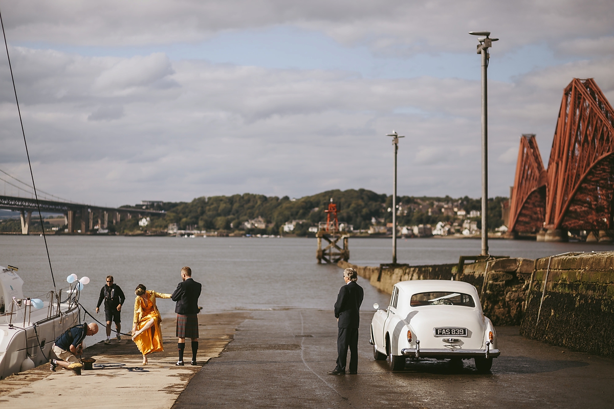 51 A yellow 1970s vintage Christian Dior gown and cape for a modern alternative Scottish wedding