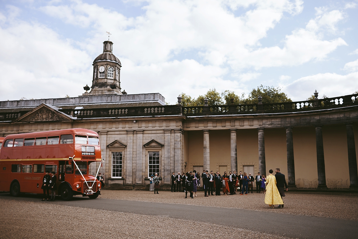 54 A yellow 1970s vintage Christian Dior gown and cape for a modern alternative Scottish wedding