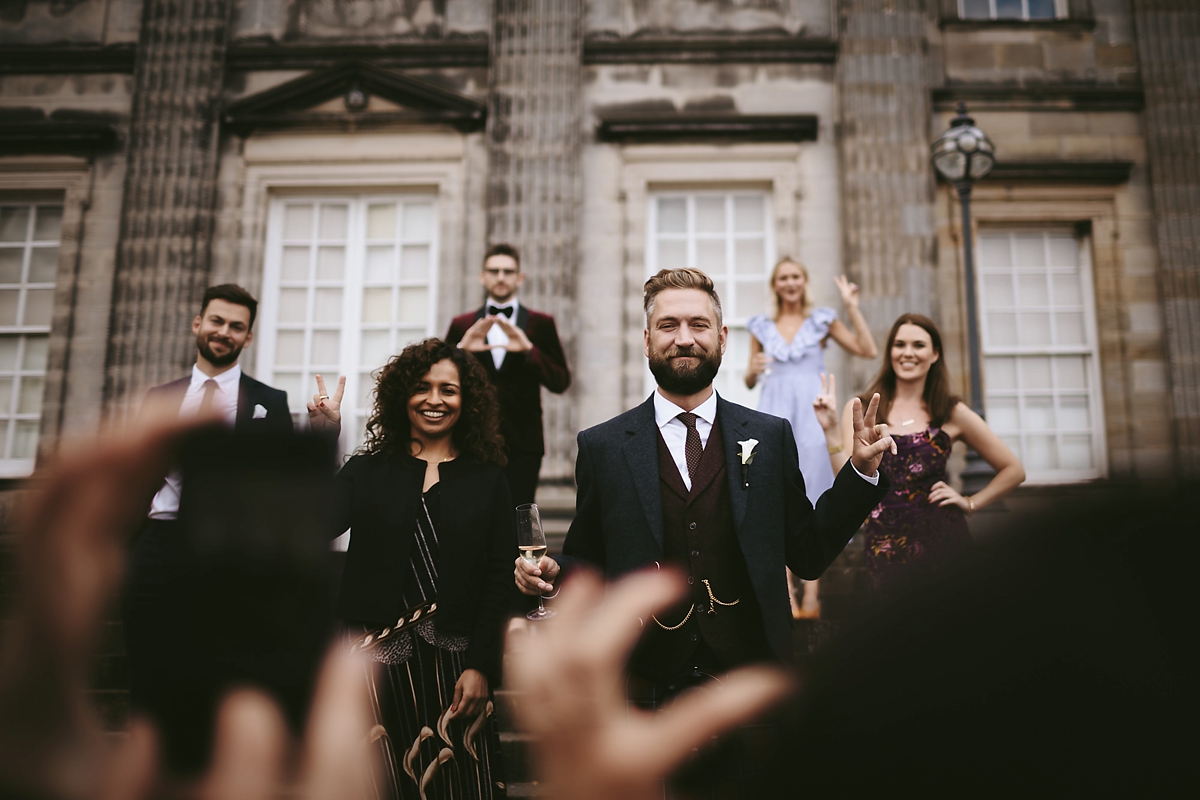 59 A yellow 1970s vintage Christian Dior gown and cape for a modern alternative Scottish wedding