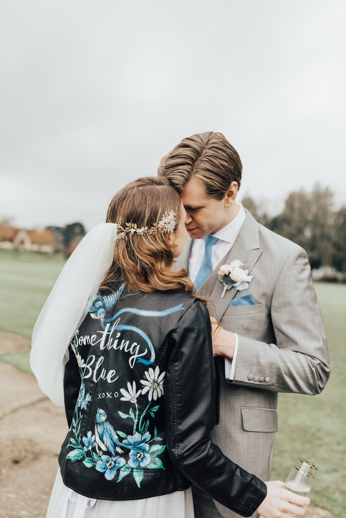 61 Something Blue wedding and bridal inspiration with a handpainted leather jacket