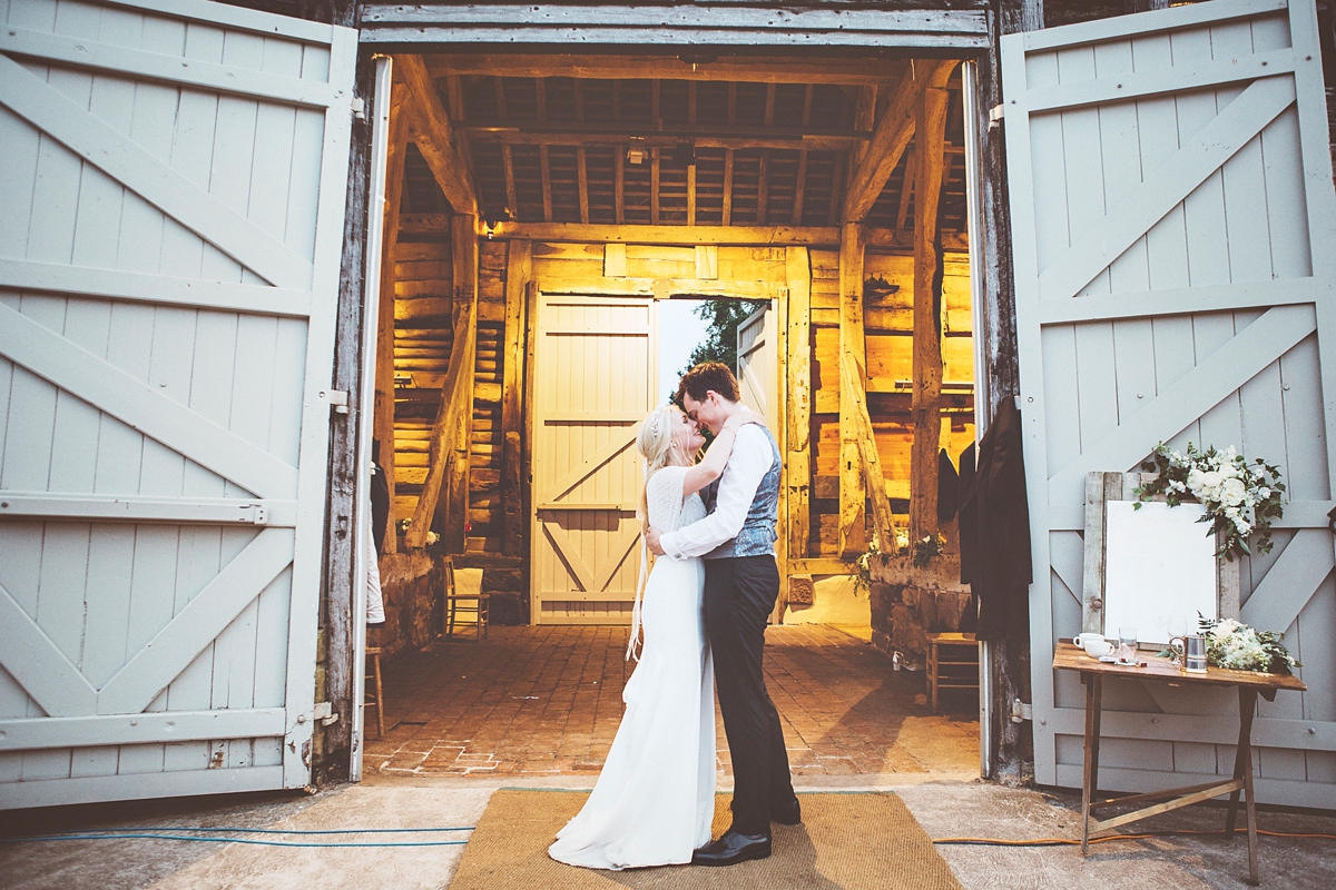 63 A Flora bride dress for a natural and rustic barn wedding in Shropshire