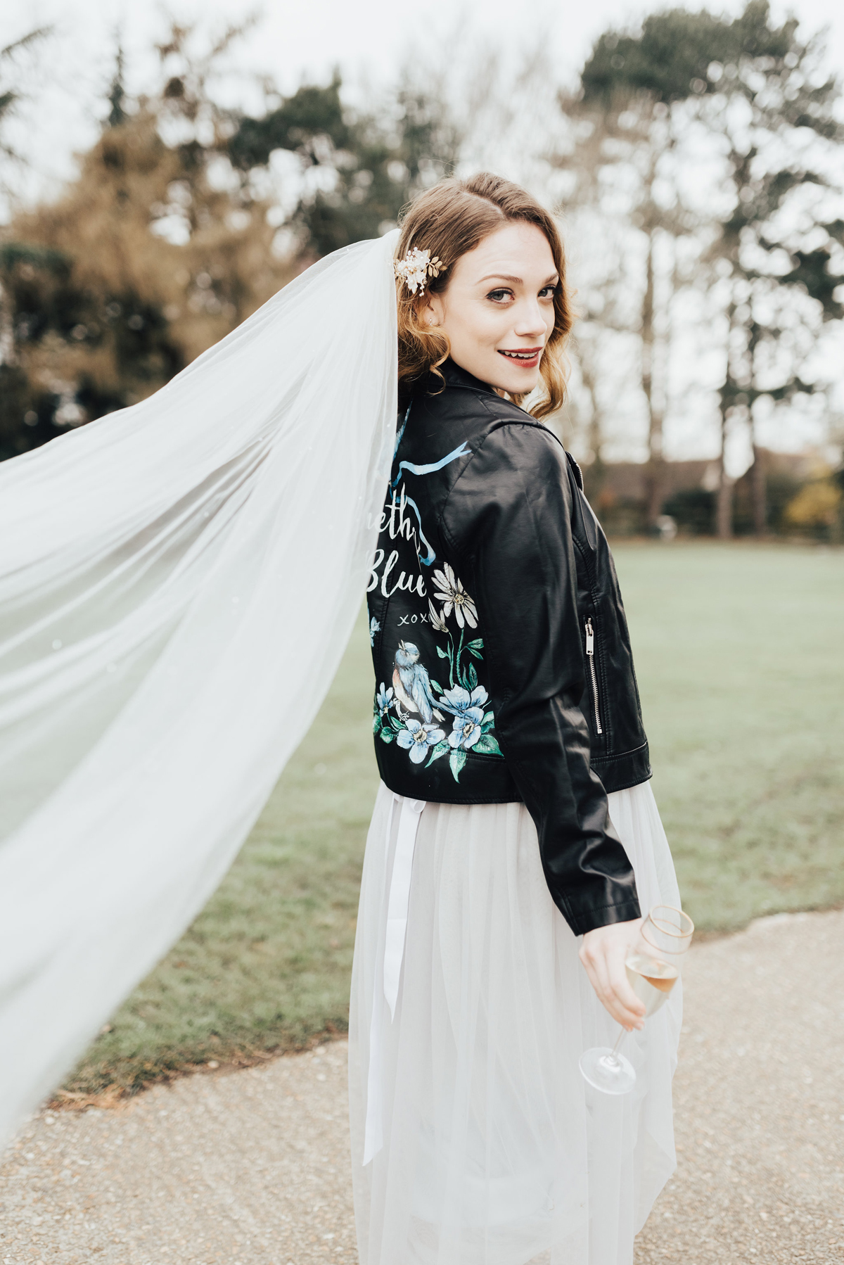 65 Something Blue wedding and bridal inspiration with a handpainted leather jacket