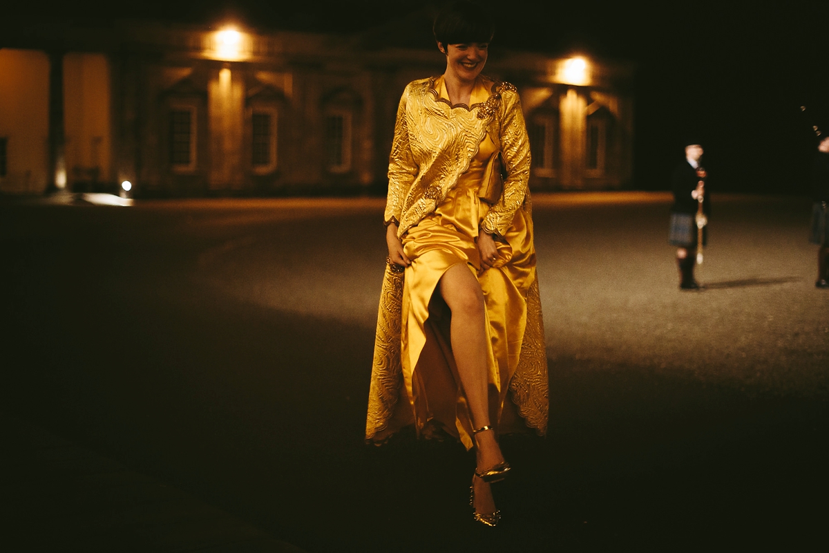 77 A yellow 1970s vintage Christian Dior gown and cape for a modern alternative Scottish wedding