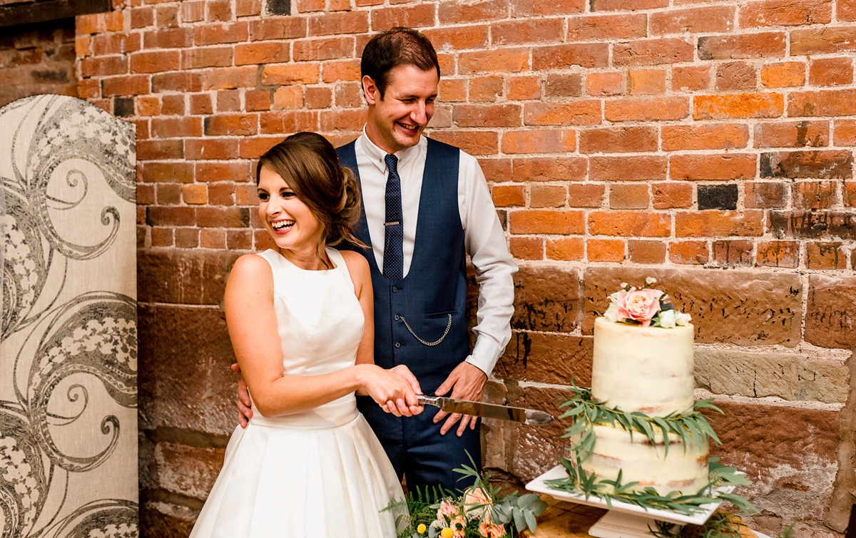 8 A Pronovias backless gownf or a simple relaxed barn wedding