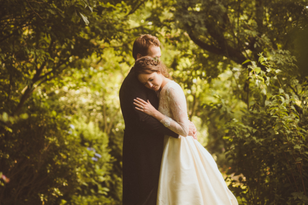 A Long Sleeved Jesus Peiro Wedding Dress for an Elegant and Flower Filled Marquee Wedding