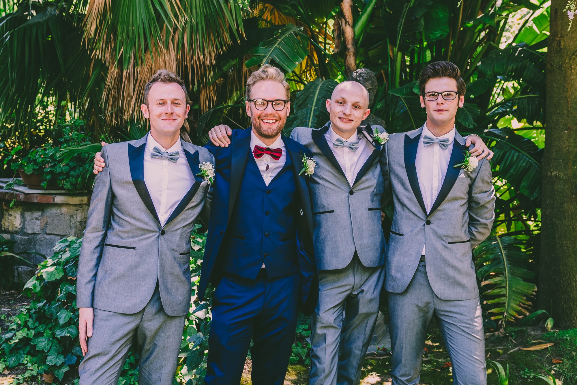 01 Groom in blue and groomsmen in pale grey and bow ties