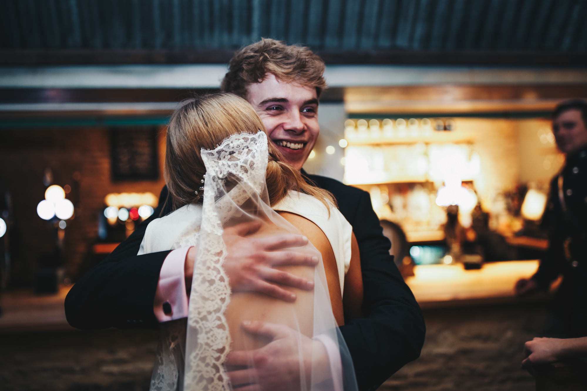 123 A backless Pronovias dress for a glamorous winter barn wedding. Images by Winnington Co. - Pronovias Elegance For a Timeless Winter Barn Wedding in the Cotswolds 123 A backless Pronovias dress for a glamorous winter barn wedding. Images by Winnington Co.