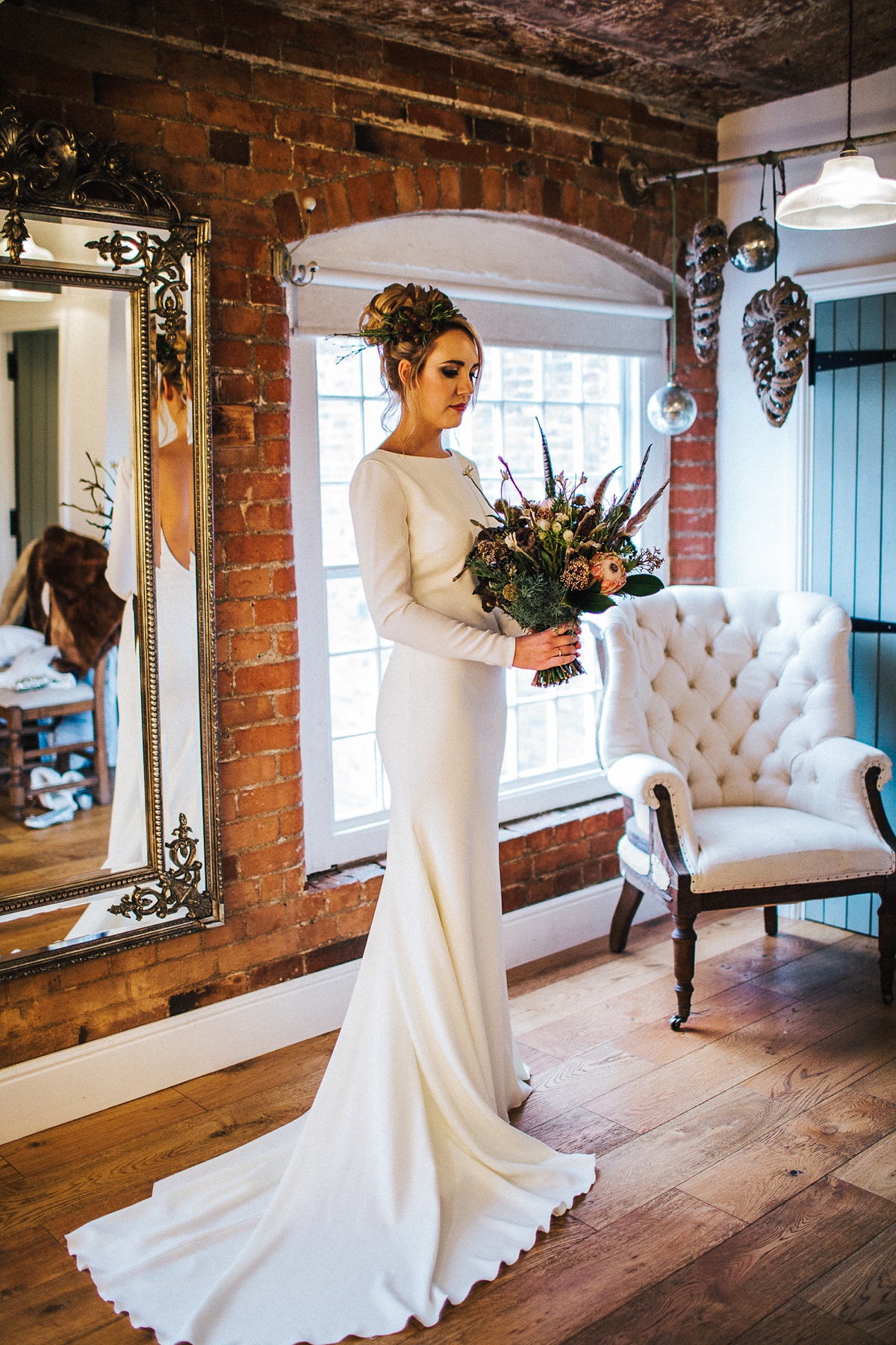 15 A long sleeved Pronovias gown for a glamorous winter wedding at West Mill in Derbyshire