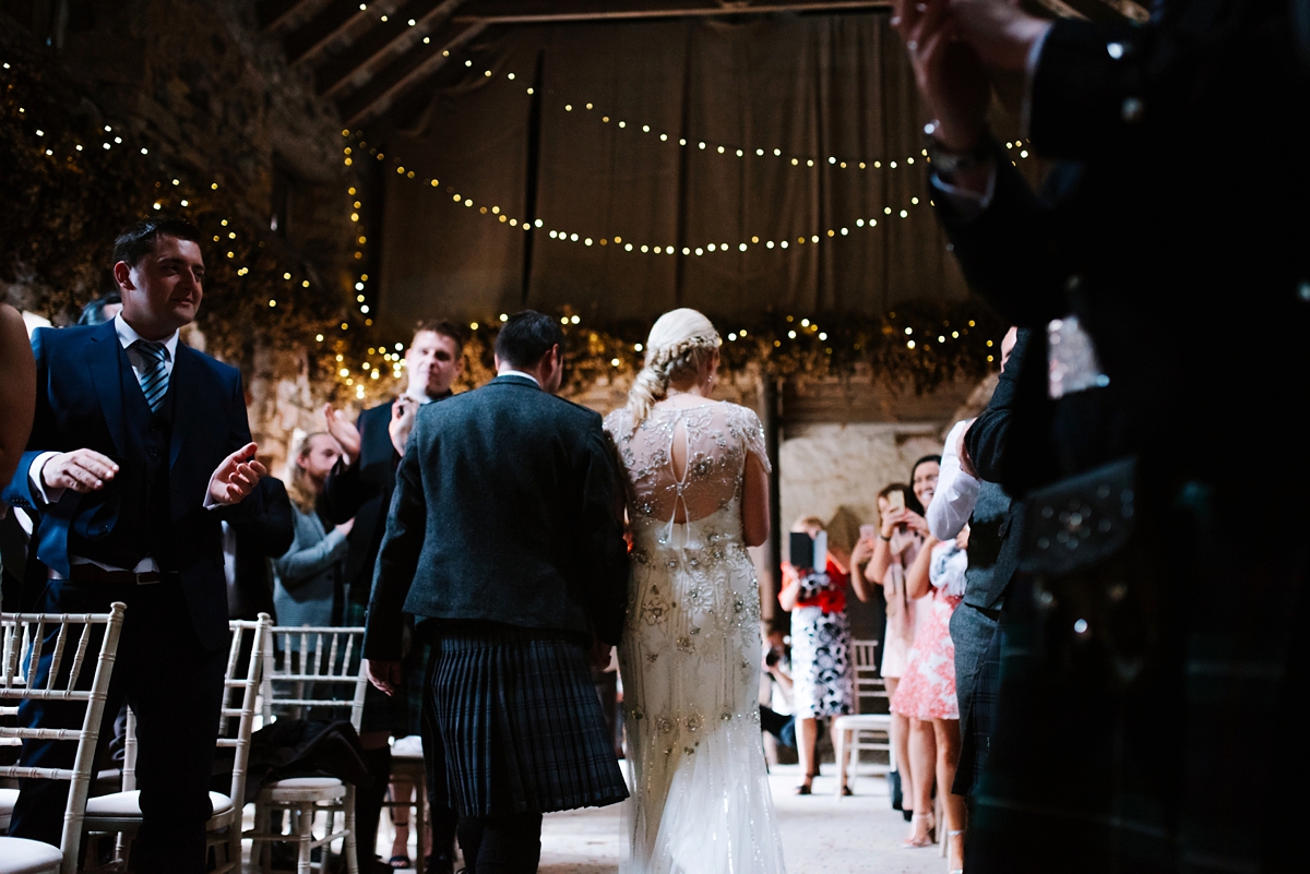 18 A Jenny Packham beaded gown for a lovely laidback country barn wedding