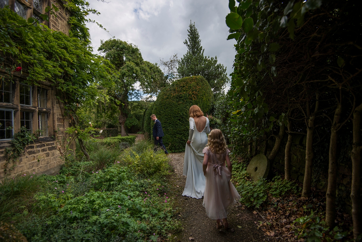 22 A beuatiful long sleeved and backless Pronovias gown for a wedding in Bakewell in Derbyshire