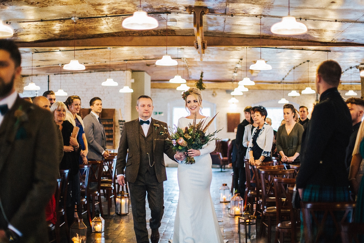 24 A long sleeved Pronovias gown for a glamorous winter wedding at West Mill in Derbyshire