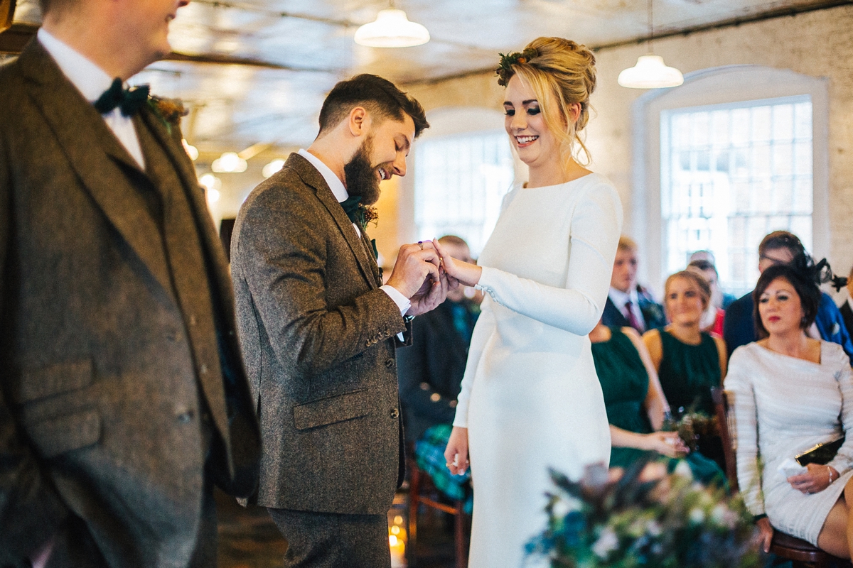 28 A long sleeved Pronovias gown for a glamorous winter wedding at West Mill in Derbyshire