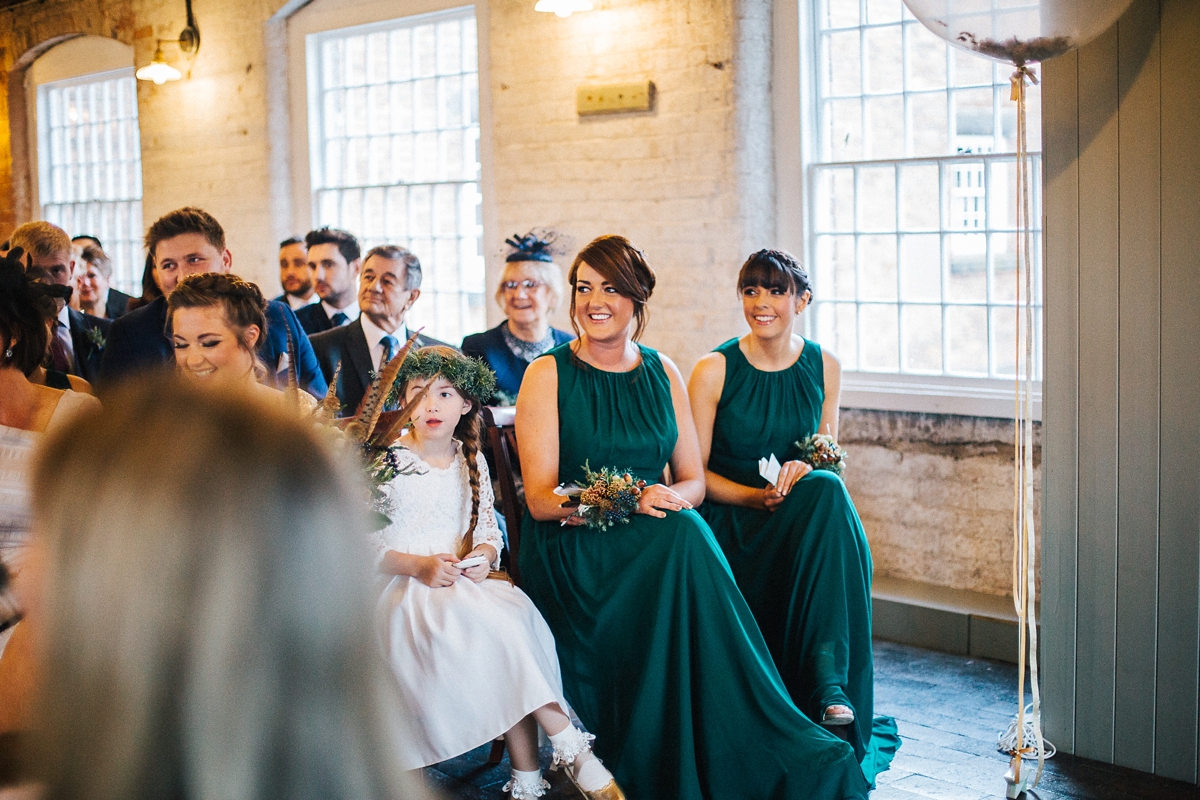 29 A long sleeved Pronovias gown for a glamorous winter wedding at West Mill in Derbyshire