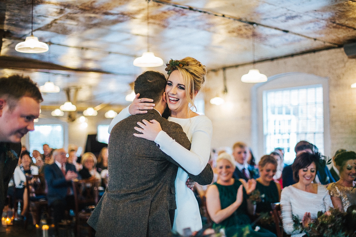 30 A long sleeved Pronovias gown for a glamorous winter wedding at West Mill in Derbyshire