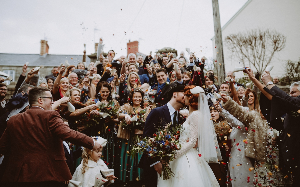 31 A tea length LouLou Bridal dress for a vintage themed farm wedding