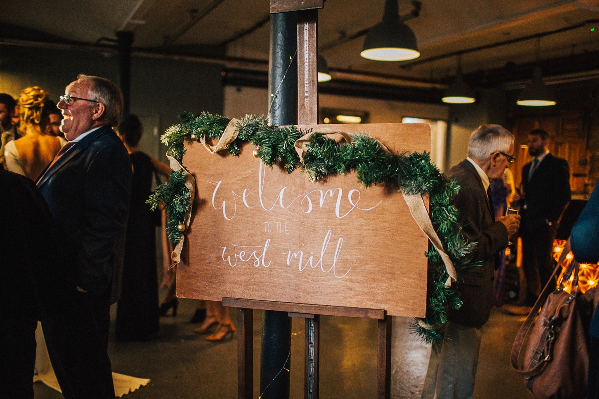 32 A long sleeved Pronovias gown for a glamorous winter wedding at West Mill in Derbyshire