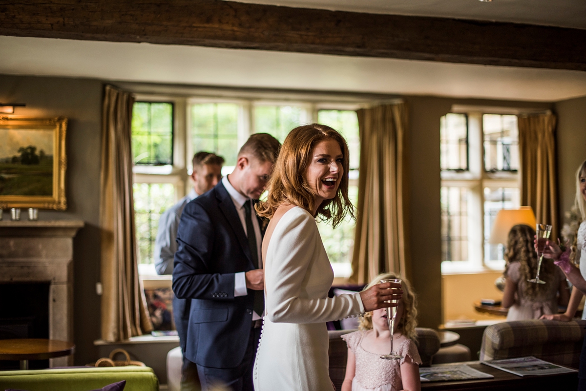 33 A beuatiful long sleeved and backless Pronovias gown for a wedding in Bakewell in Derbyshire