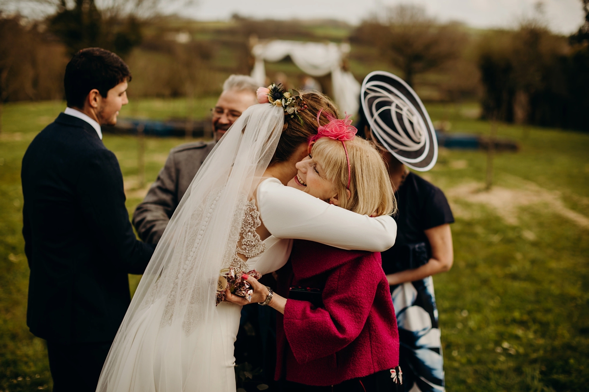 33 A long sleeved Justin Alexander dress for an elegant Glasshouse Wedding