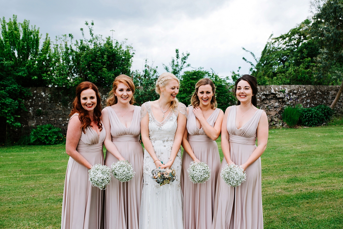 34 A Jenny Packham beaded gown for a lovely laidback country barn wedding