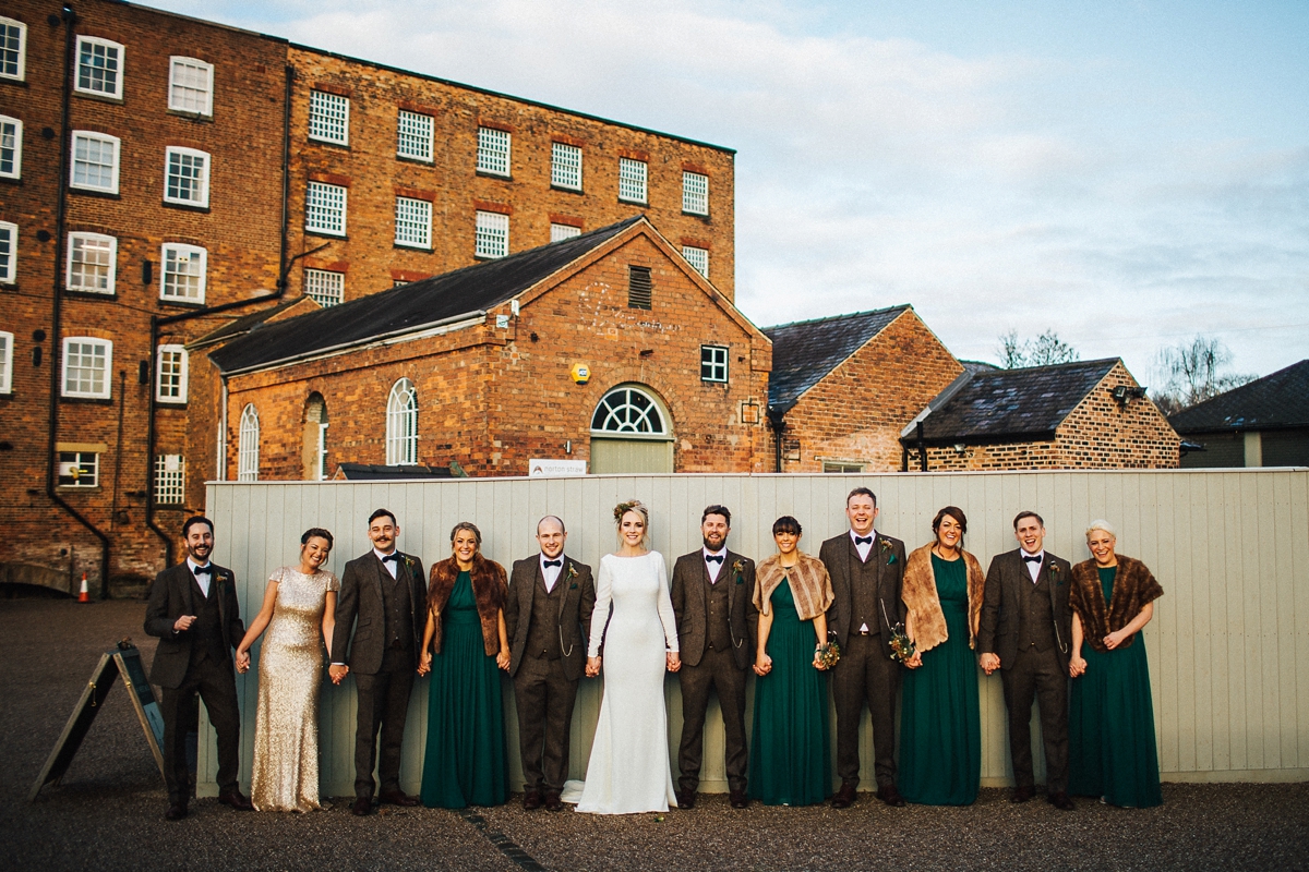 39 A long sleeved Pronovias gown for a glamorous winter wedding at West Mill in Derbyshire