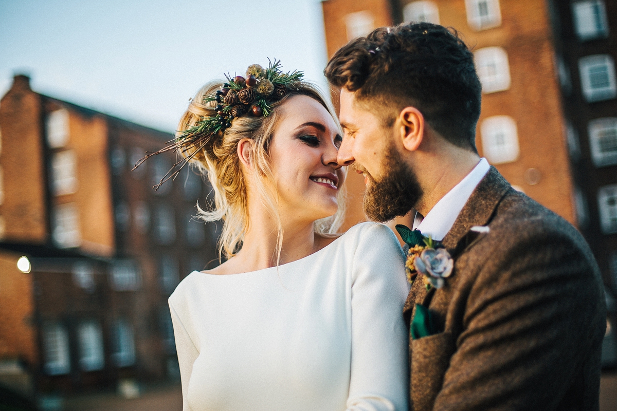 40 A long sleeved Pronovias gown for a glamorous winter wedding at West Mill in Derbyshire