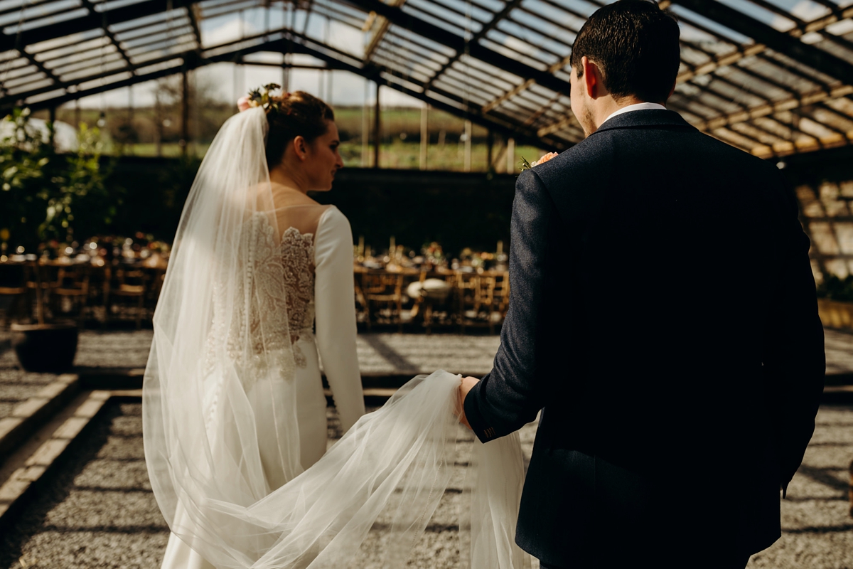 41 A long sleeved Justin Alexander dress for an elegant Glasshouse Wedding