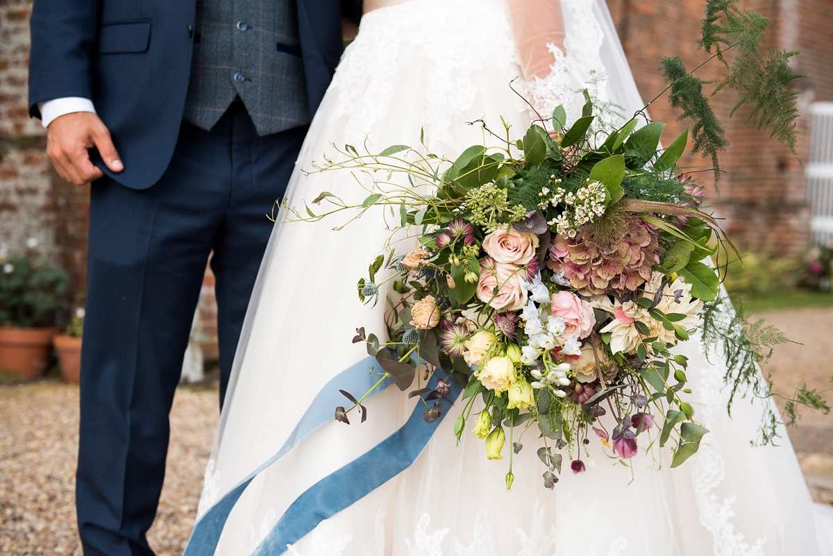 41 An Allure Bridals gown for a charming barn wedding