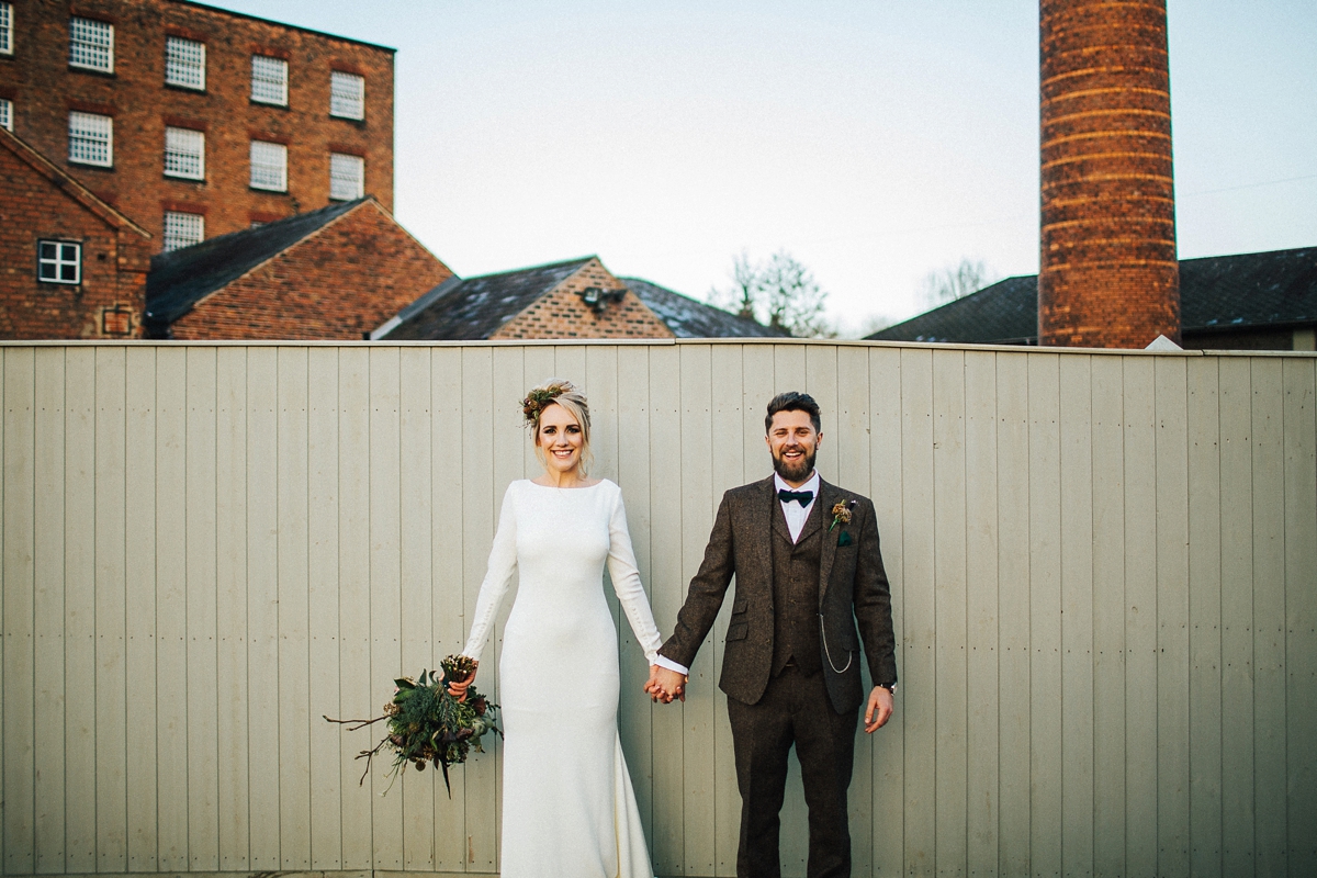 42 A long sleeved Pronovias gown for a glamorous winter wedding at West Mill in Derbyshire