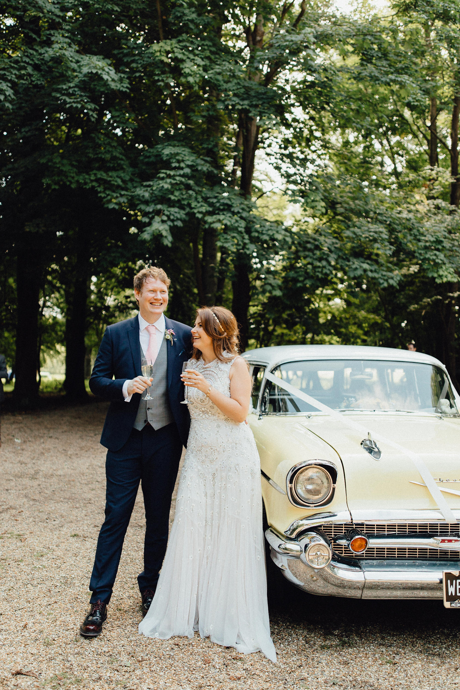 46 Newlywed bride in a Needle Thread dress by pale yellow retro chevrolet wedding car