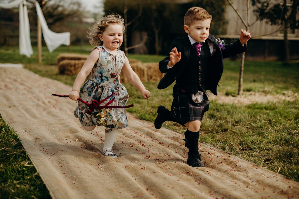 48 A long sleeved Justin Alexander dress for an elegant Glasshouse Wedding