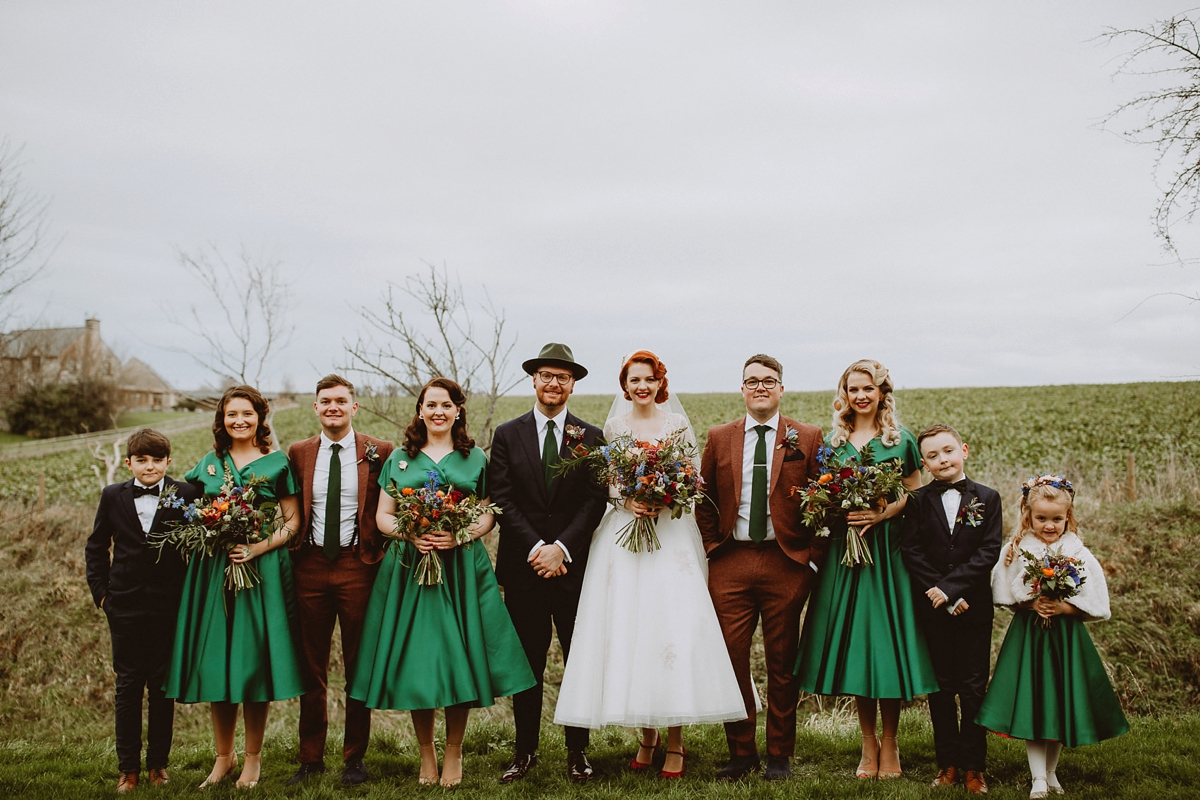 49 A tea length LouLou Bridal dress for a vintage themed farm wedding