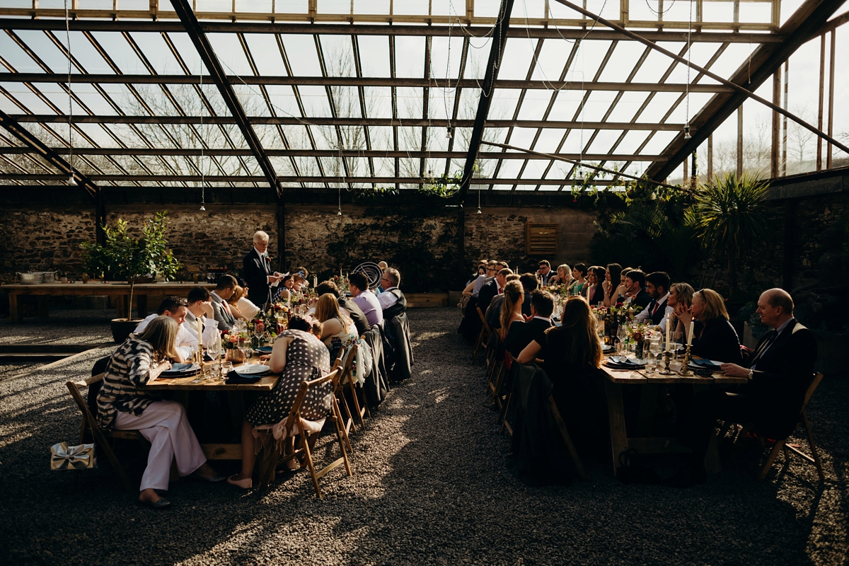 53 A long sleeved Justin Alexander dress for an elegant Glasshouse Wedding